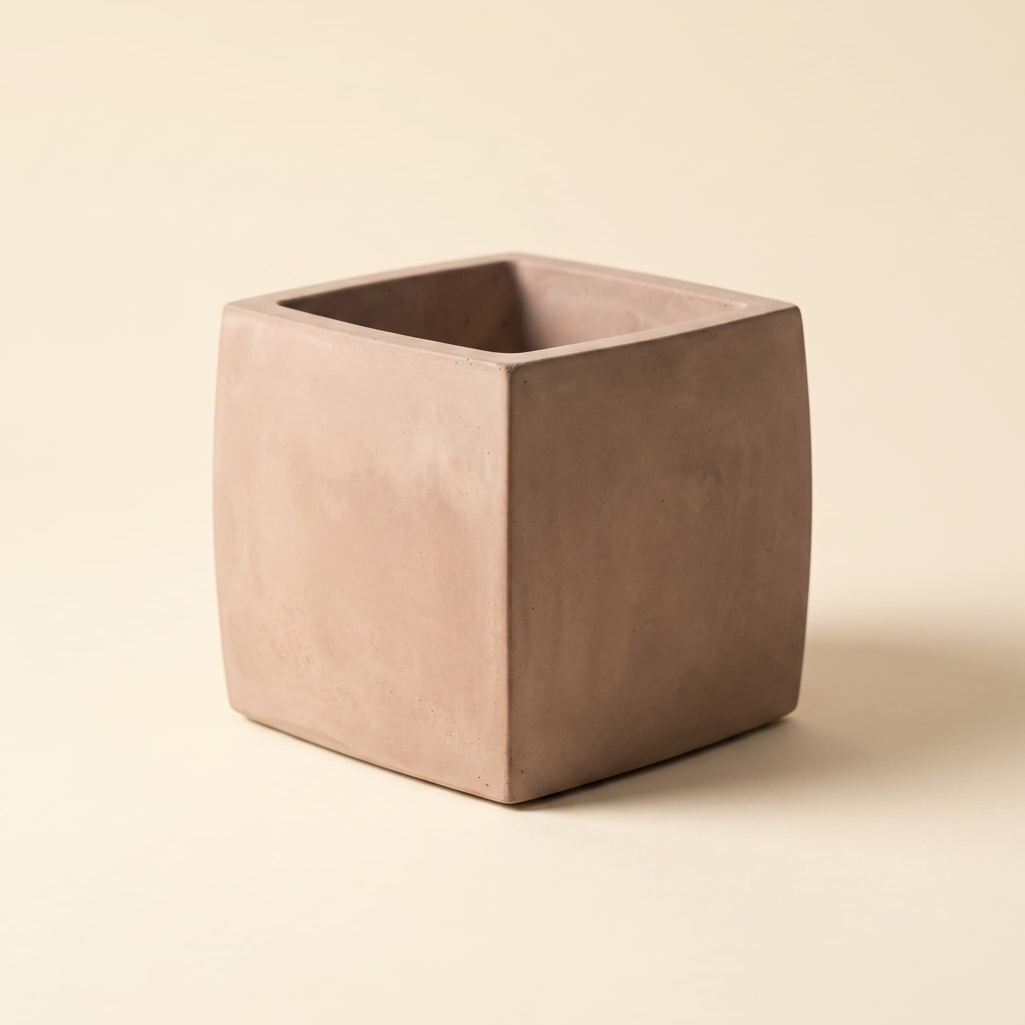 Taupe cube vessel with bulbous outer walls