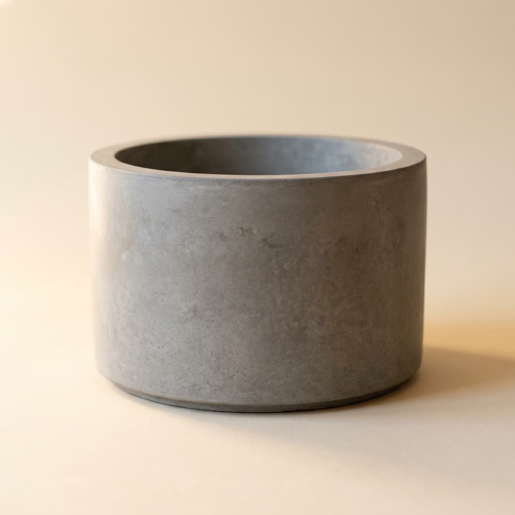 Wide grey concrete cylinder vessel