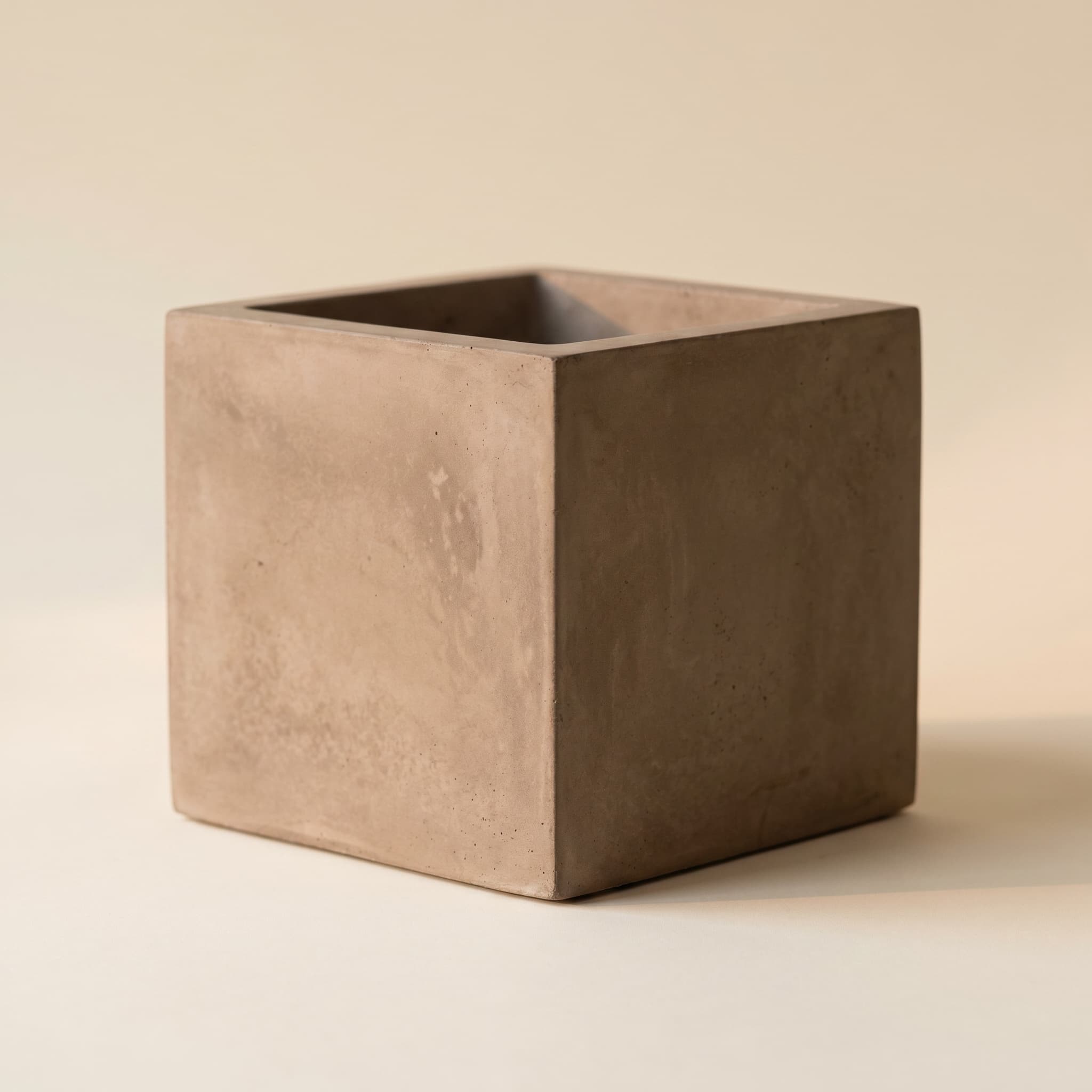 Taupe concrete cube vessel