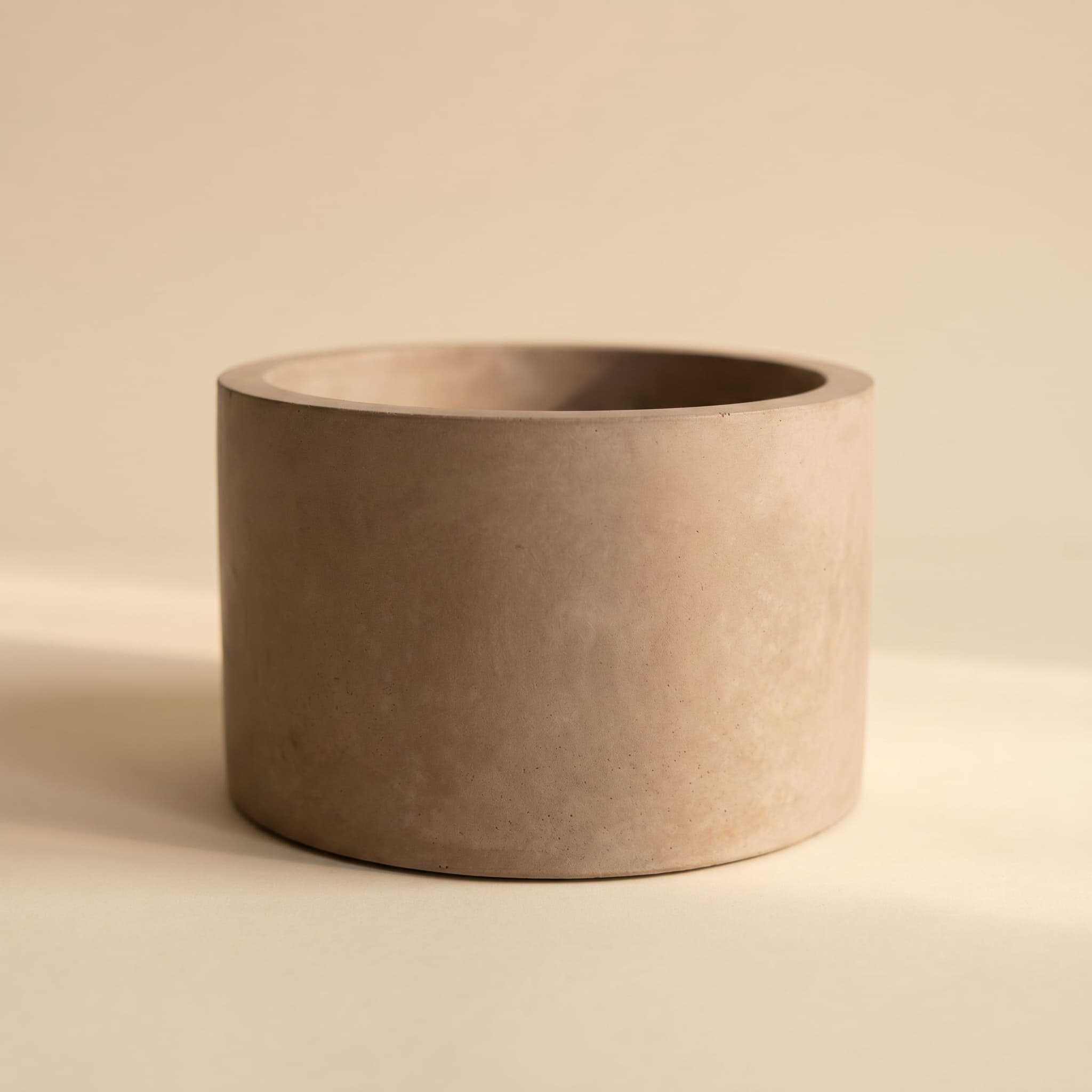 Wide taupe concrete cylinder vessel